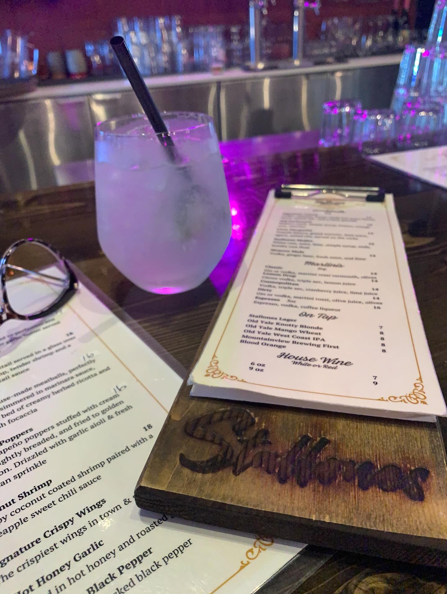 Exploring what the locals are up to at @stallones.hope, paired with a #stallonesmojito and bites, surrounded by the subtle violet glow! Mmmmm!