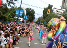 Velvet Steele and Stilters Co-op Radio float contingent 2015